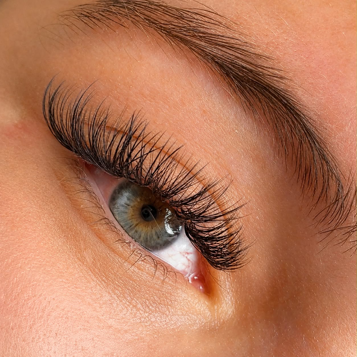 Close-up volume lash artistry by AURE